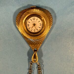N18 - Caravelle by Bulova Gold Pendant Watch